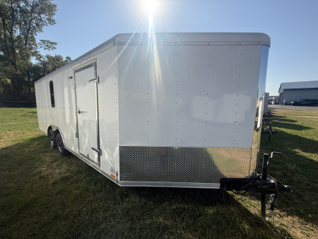 New RC Trailers 8.5x25 10k snow/car hauler,torsion axles with alum. Wheels,5' wedge nose,30 amp sevice with cord,12 volt battery,4' caninet,2 windows an fuel doors, round top