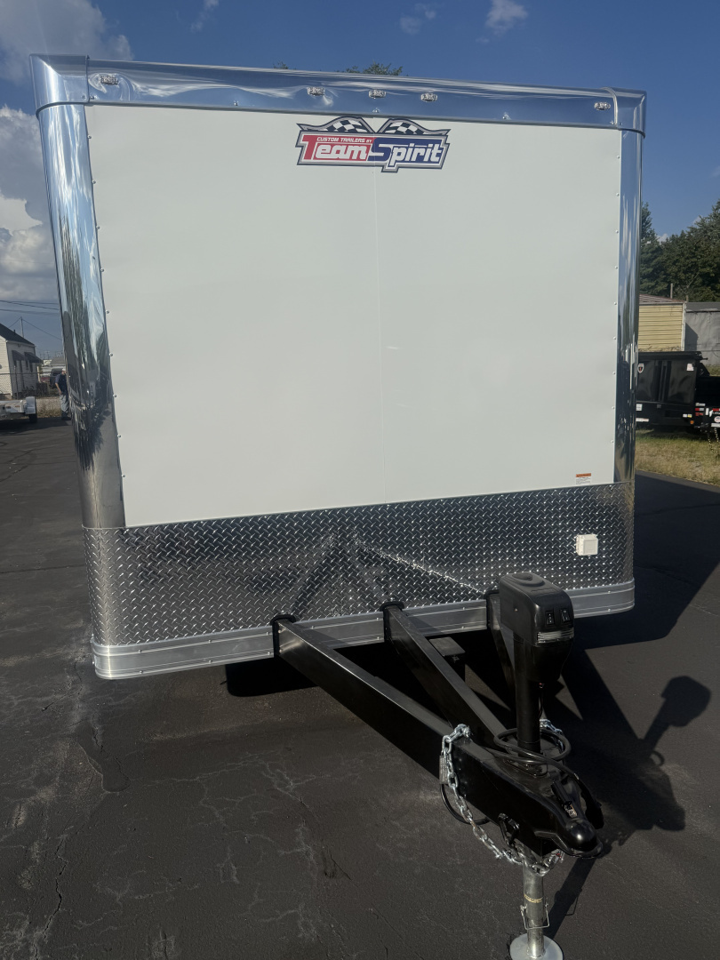 New 2025 Team Spirit Trailers 8.5x24 10k Cabinets,coin flooring,Rims,110 package,Radius front,Drop skirts,Extended tongue,Rear wing,12v. Interior,A/C prep. Side lights Electric jack, Battery, Powqer cord Car / Racing Trailer