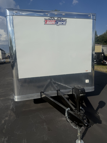 New 2025 Team Spirit Trailers 8.5x24 10k Cabinets,coin flooring,Rims,110 package,Radius front,Drop skirts,Extended tongue,Rear wing,12v. Interior,A/C prep. Side lights Electric jack, Battery, Powqer cord Car / Racing Trailer