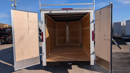New 2026 Homesteader 6x12 Tandem Intrepid V-Nose Contractor Trailer w/ Rear Barn Doors & Ladder Racks