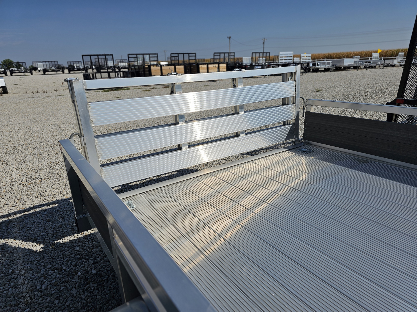 New 2023 Sure-Trac 7 x 12 3K Idler Aluminum Composite High Side Utility Trailer