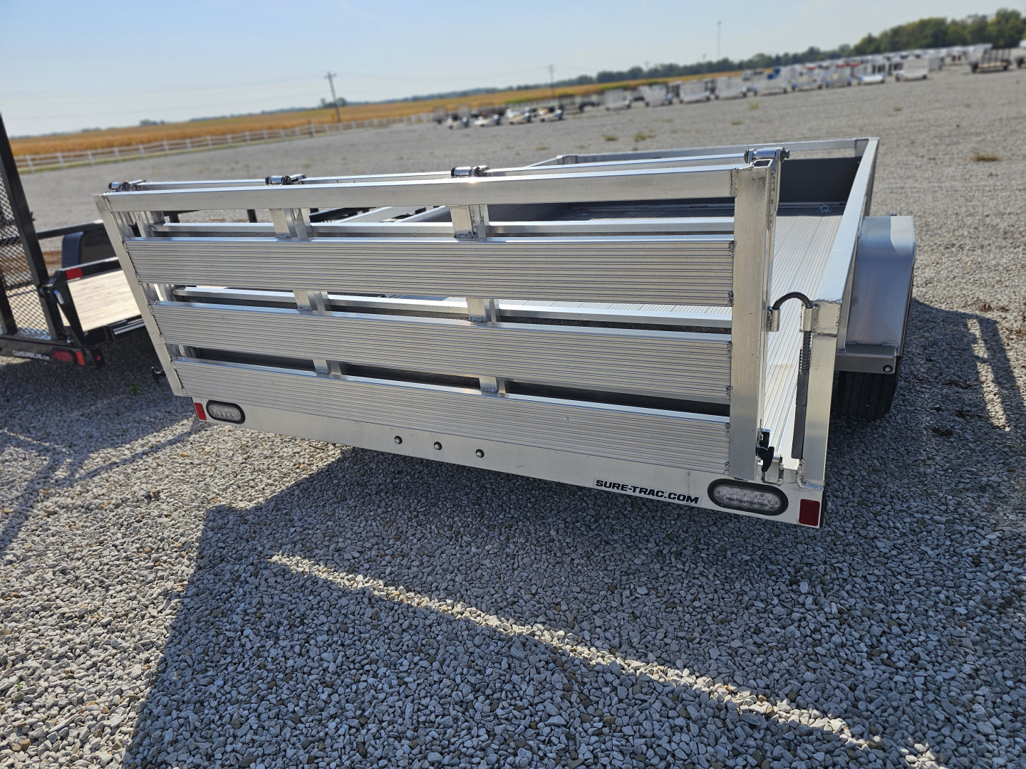 New 2023 Sure-Trac 7 x 12 3K Idler Aluminum Composite High Side Utility Trailer
