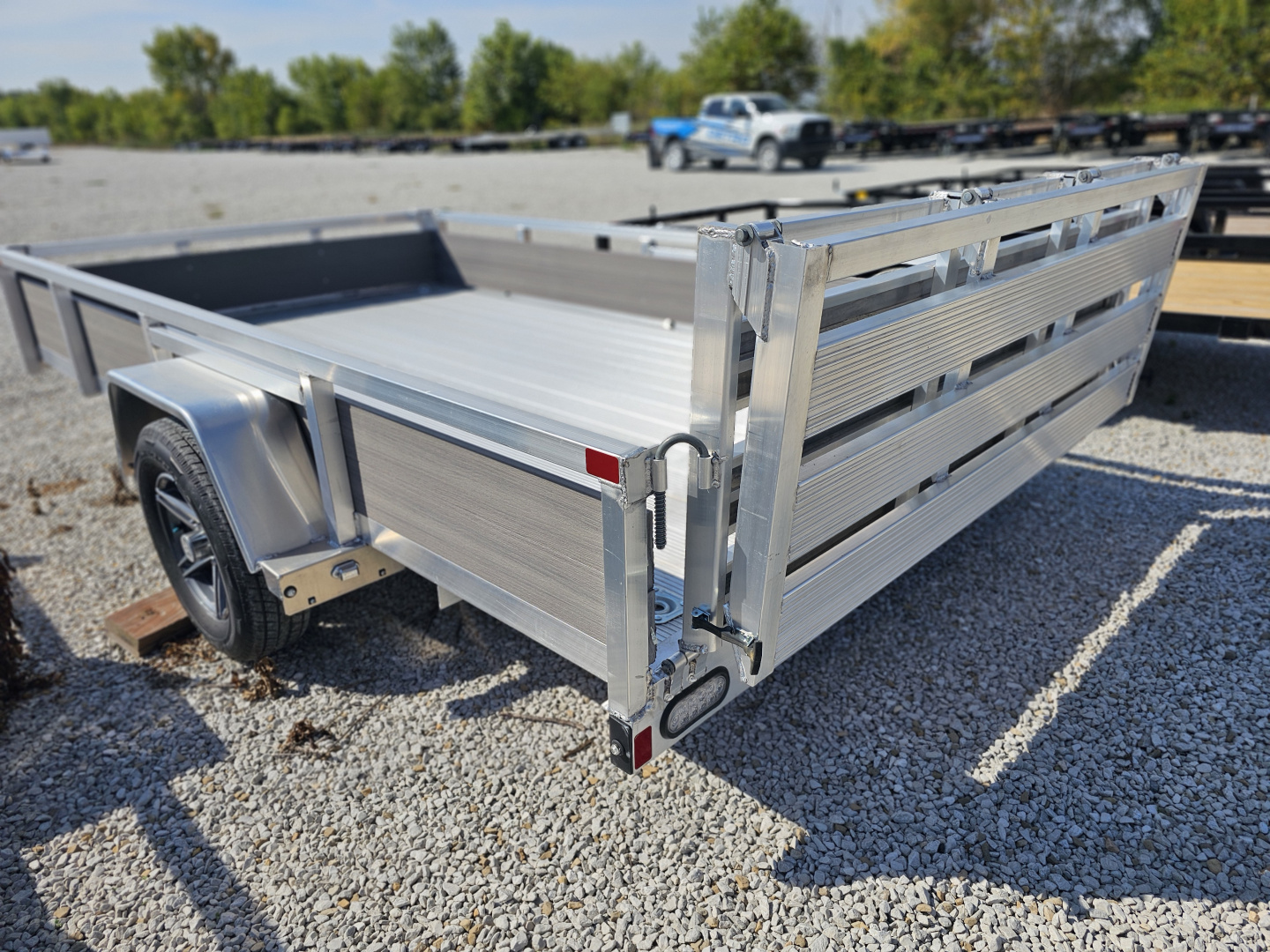 New 2023 Sure-Trac 7 x 12 3K Idler Aluminum Composite High Side Utility Trailer