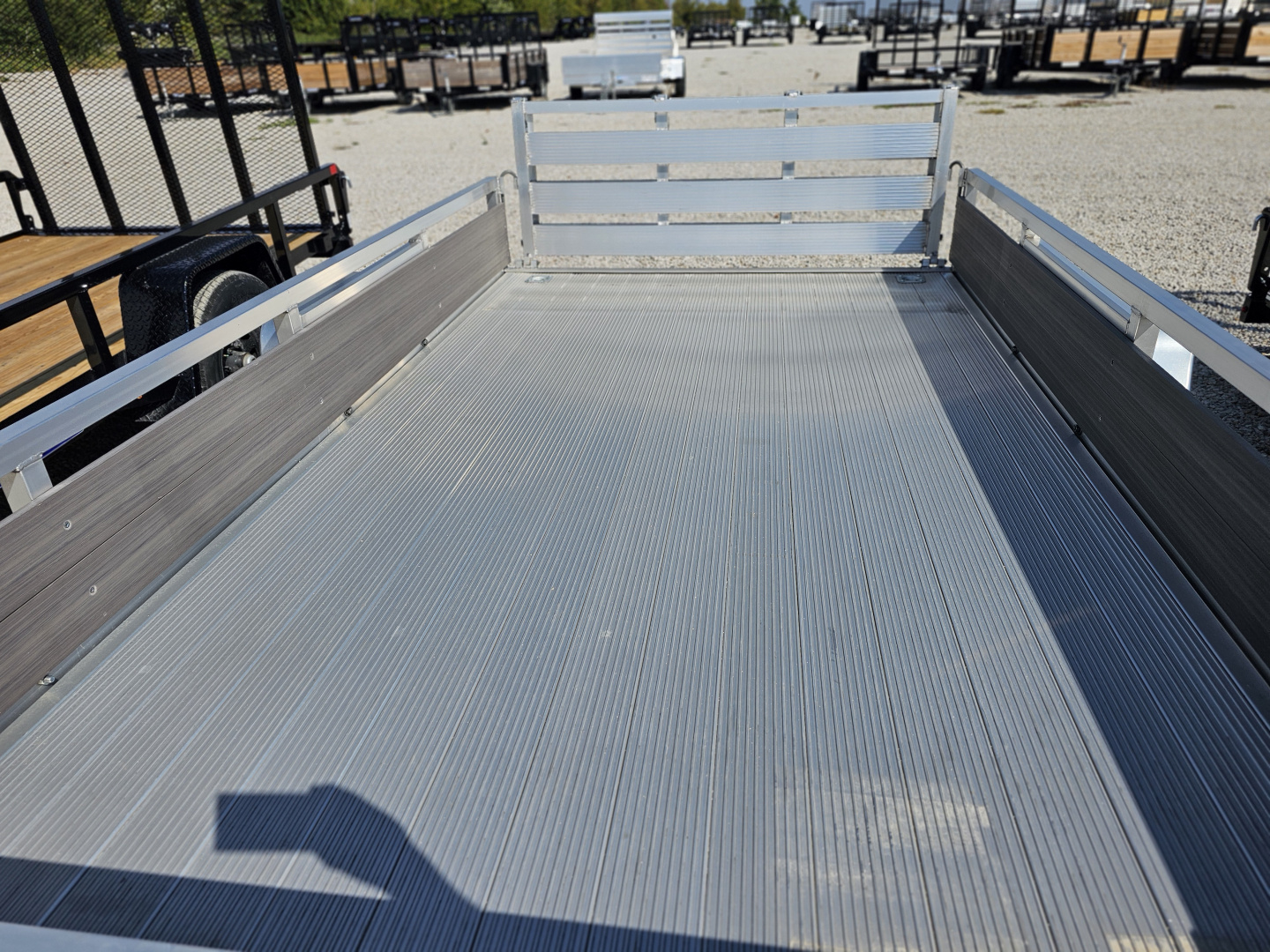 New 2023 Sure-Trac 7 x 12 3K Idler Aluminum Composite High Side Utility Trailer