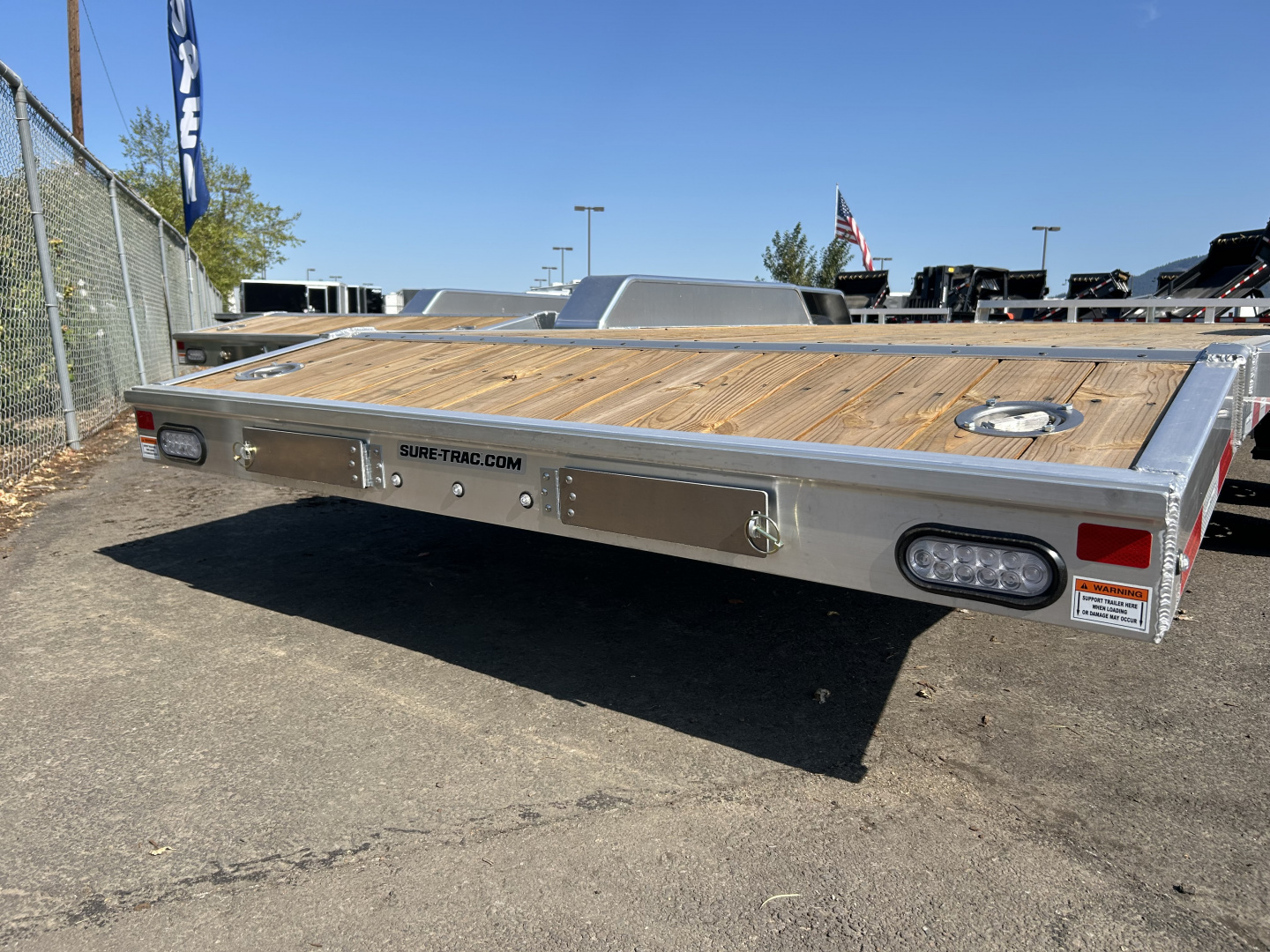 New 2025 Sure-Trac 7x20 (18+2) Aluminum Frame Wood Deck Car Hauler 7K GVWR