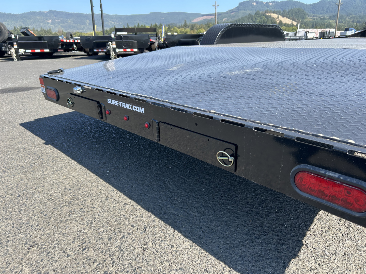 New 2025 Sure-Trac 7x20 (16+4) Steel Deck Car Hauler 10K GVWR