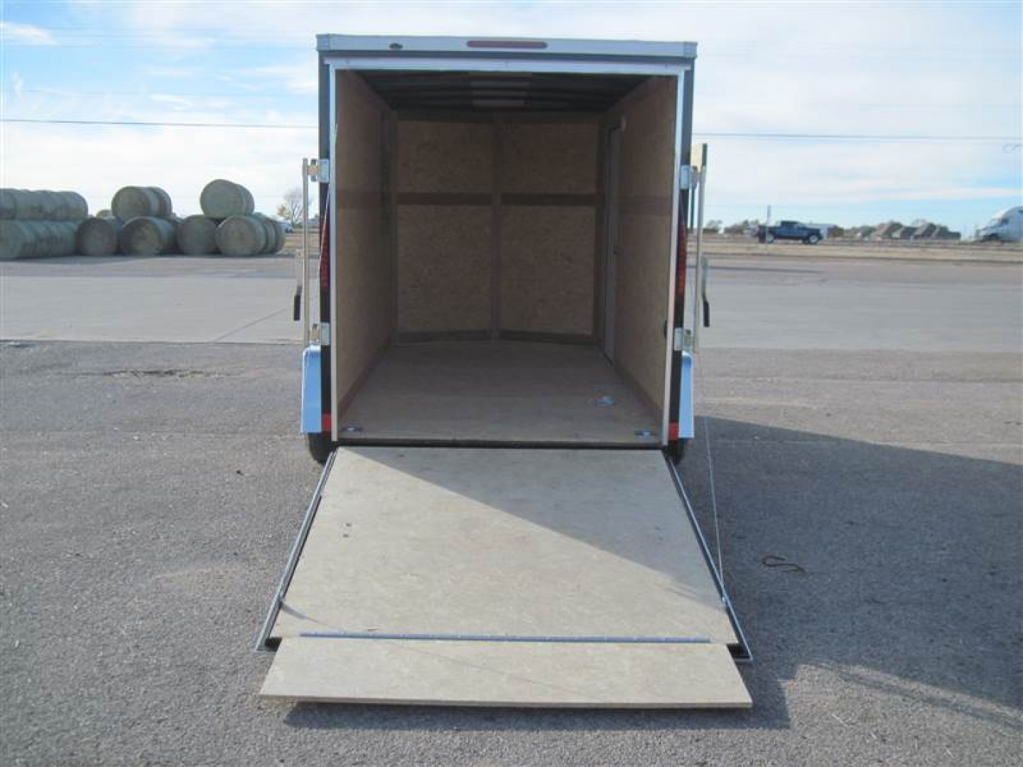 New 2025 Wells Cargo 6x12x6.5 FastTrac Deluxe Cargo w/ Ramp