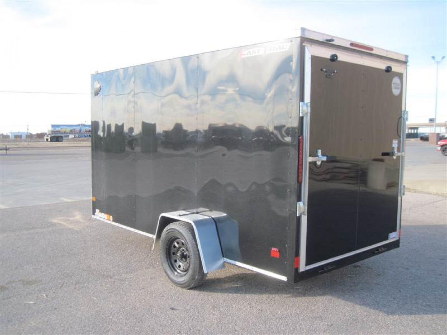 New 2025 Wells Cargo 6x12x6.5 FastTrac Deluxe Cargo w/ Ramp