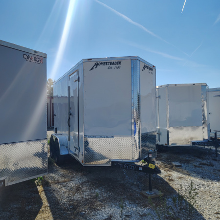 New 2026 Homesteader 6x12 TA Cargo / Enclosed Trailer with barn doors, 6' interior height, 35k axles, intrepid series