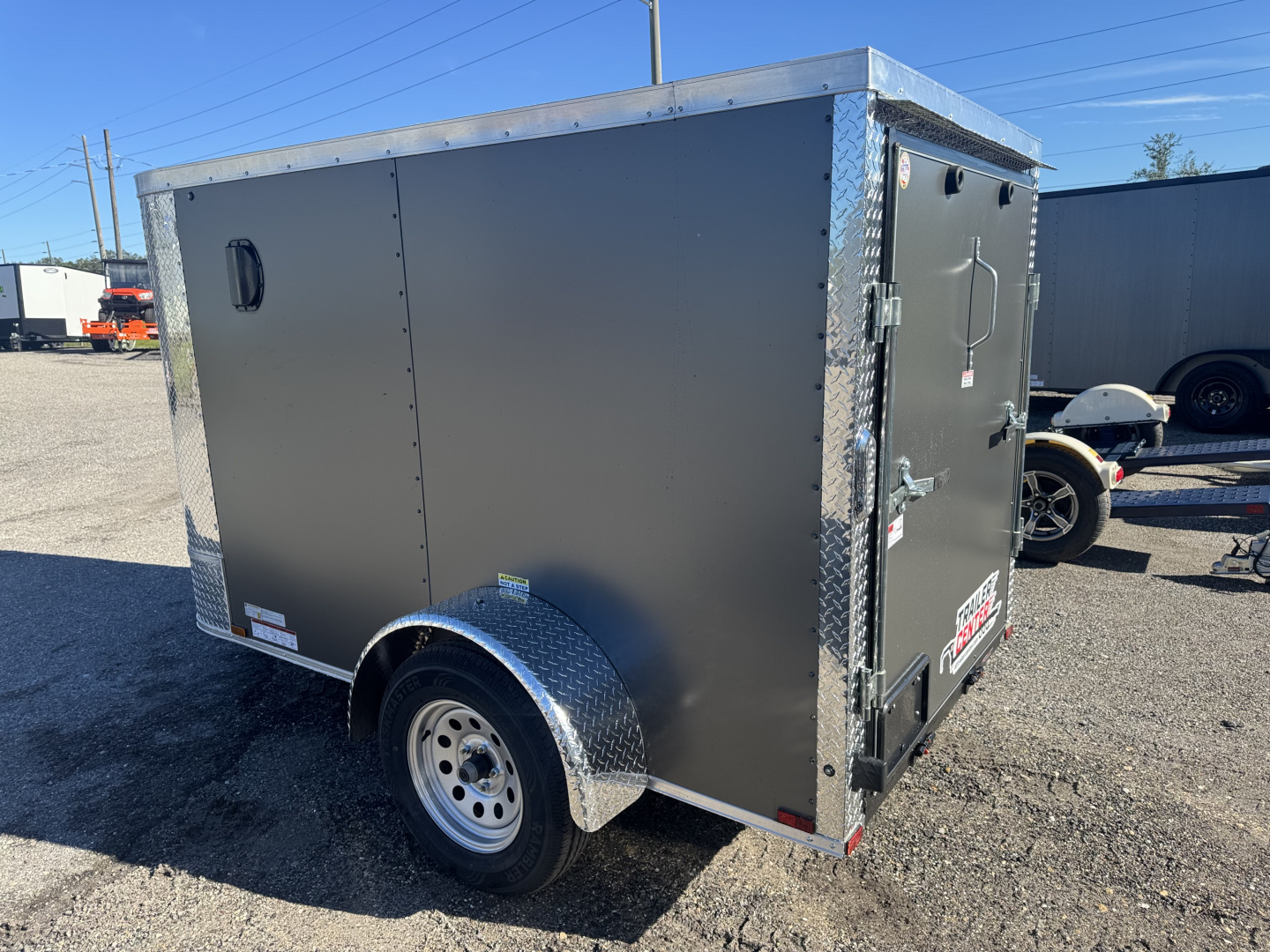 New 2026 Arising 5X8 SINGLE AXLE 2990 LB GVWR Cargo / Enclosed Trailer WITH 5FT INTERIOR HEIGHT, REAR RAMP DOOR, FULL TUBE FRAME, COMPOSITE .080 EXTERIOR, 2 SIDE VENTS AND SHORT ENOUGH TO FIT INSIDE YOUR GARAGE!.