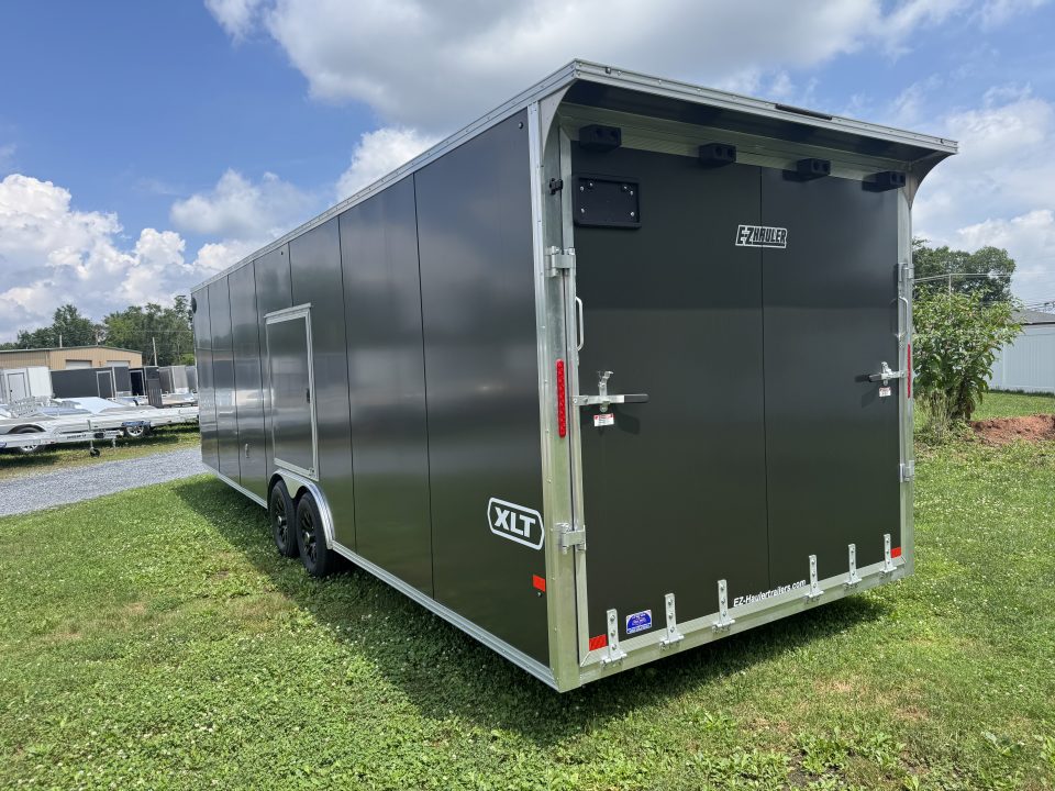 New 2027 E-Z Hauler EZEC8.5X28CH-XLT-P Car Hauler 71 SERIES 7 FOOT 1 INCH INTERIOR HEIGHT .080 POLY SIDES ESCAPE DOOR FREE ALUMINUM WHEEL UPGRADE SUMMER SALE ON NOW