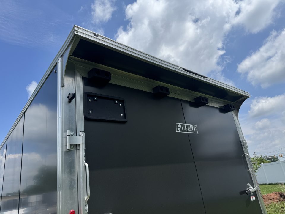 New 2027 E-Z Hauler EZEC8.5X28CH-XLT-P Car Hauler 71 SERIES 7 FOOT 1 INCH INTERIOR HEIGHT .080 POLY SIDES ESCAPE DOOR FREE ALUMINUM WHEEL UPGRADE SUMMER SALE ON NOW