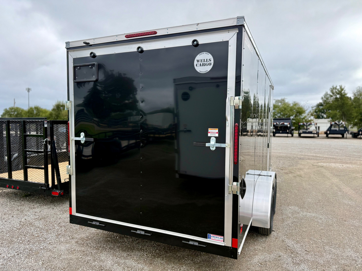 New 2026 Wells Cargo FT716T2-D Black Cargo / Enclosed Trailer