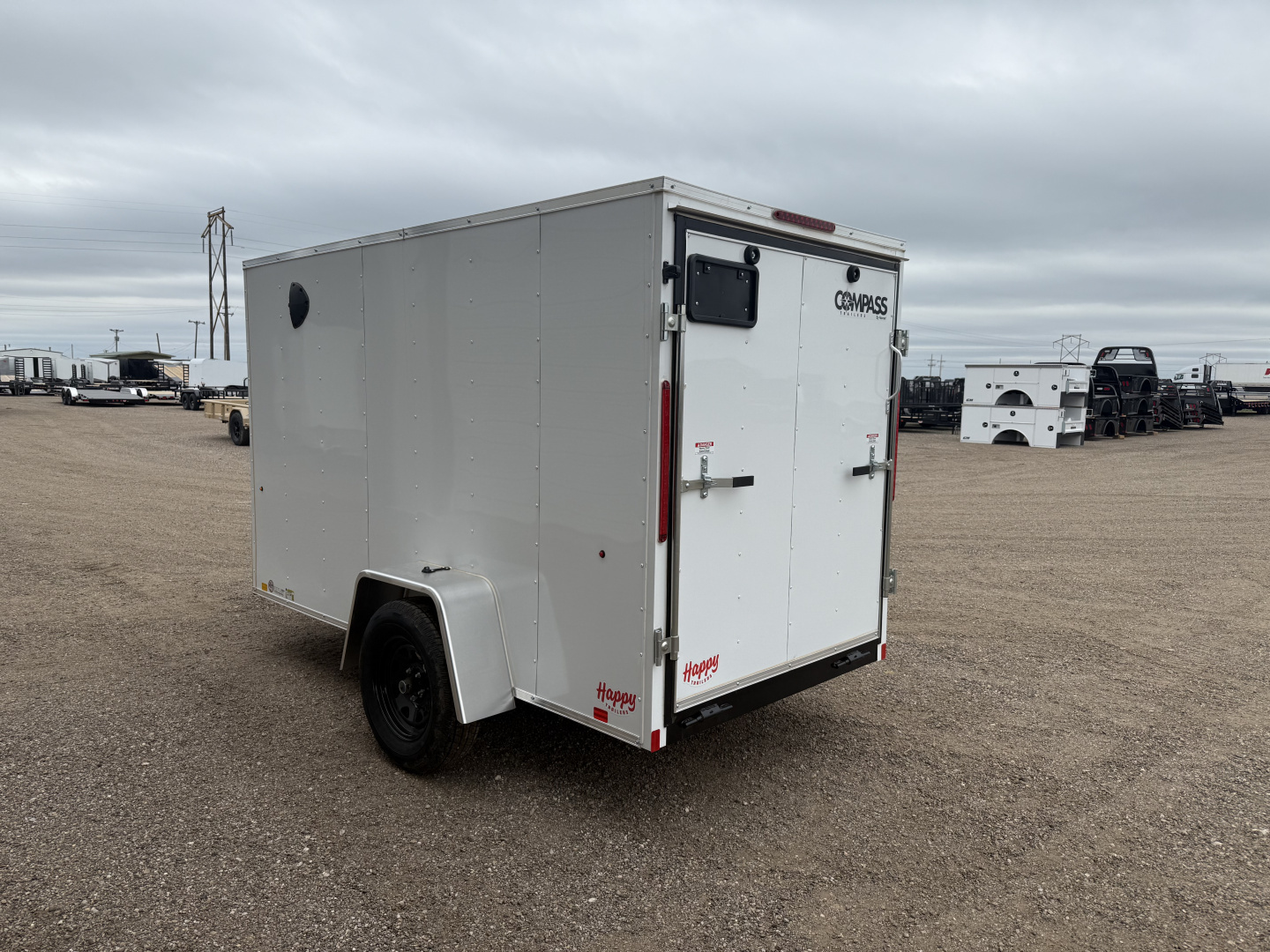 New 2026 Compass 5'x10' Enclosed Cargo Trailer - Indigo DLX