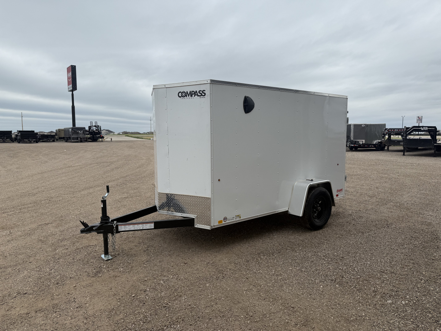 New 2026 Compass 5'x10' Enclosed Cargo Trailer - Indigo DLX
