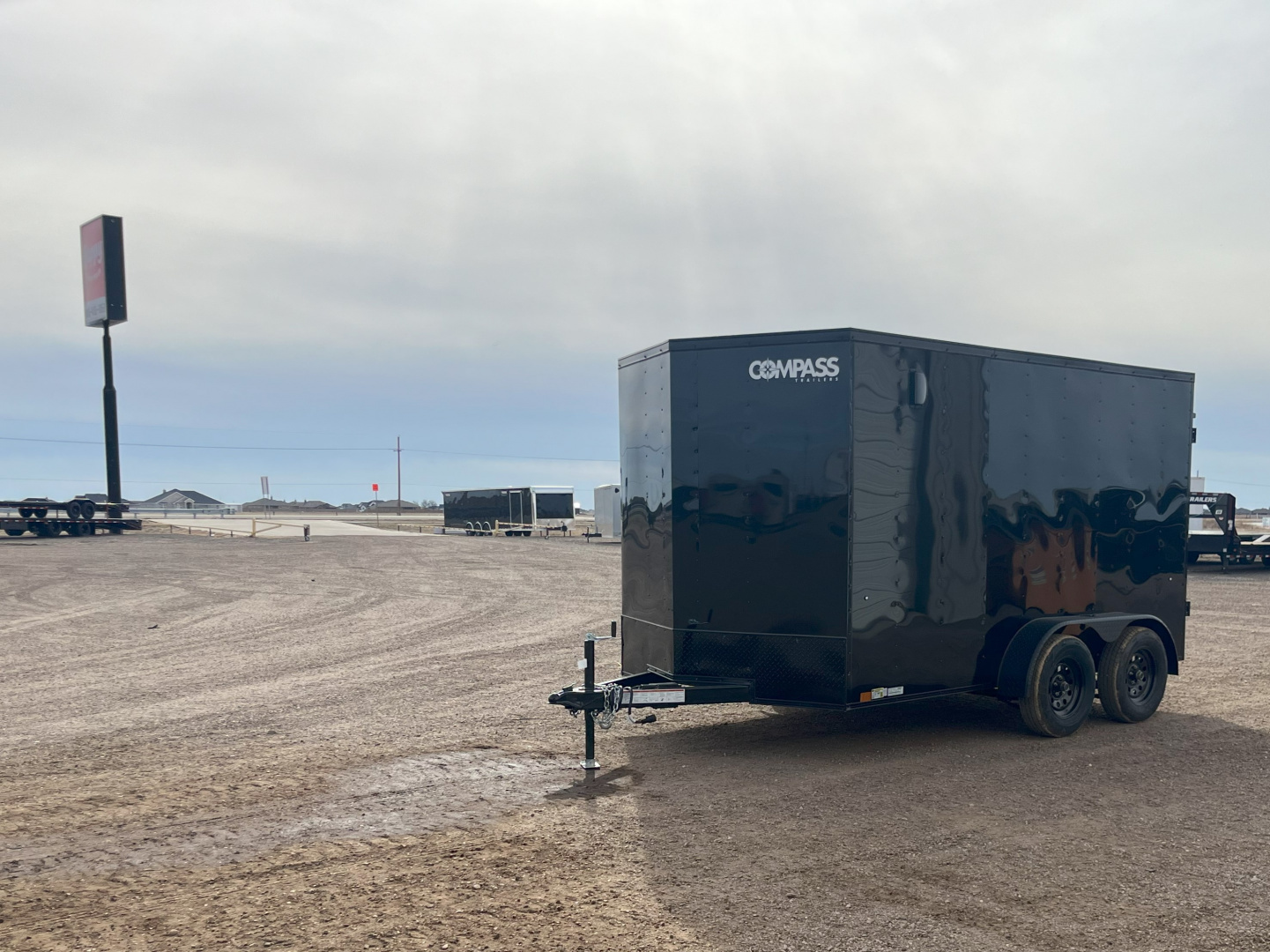 New 2026 Compass 7'x12' Enclosed Cargo Trailer - Indigo DLX