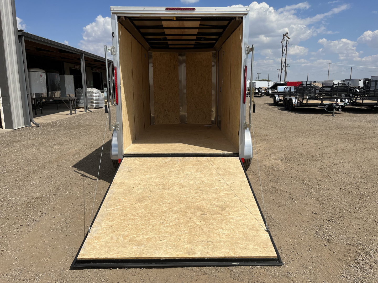 New 2026 Compass 6'x12' Enclosed Cargo Trailer - Indigo DLX