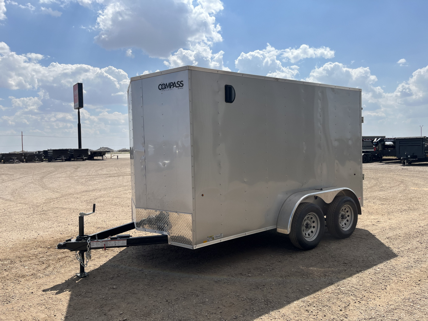 New 2026 Compass 6'x12' Enclosed Cargo Trailer - Indigo DLX
