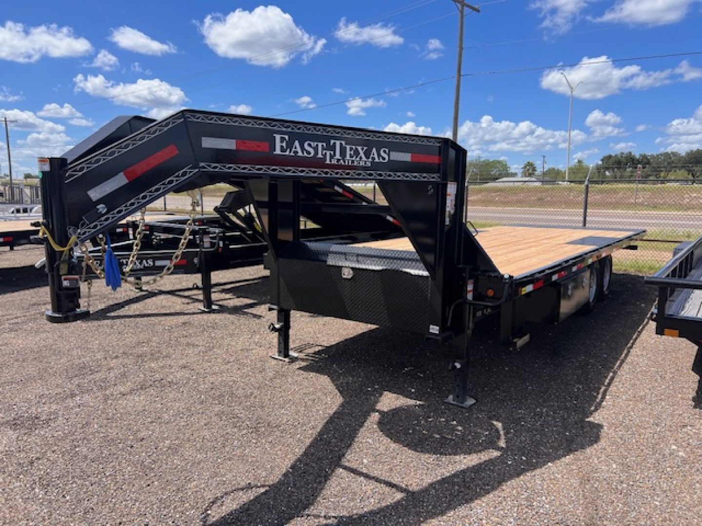 New 2026 East Texas Trailers 102x24ft Gooseneck Tilt Flatbed Trailer