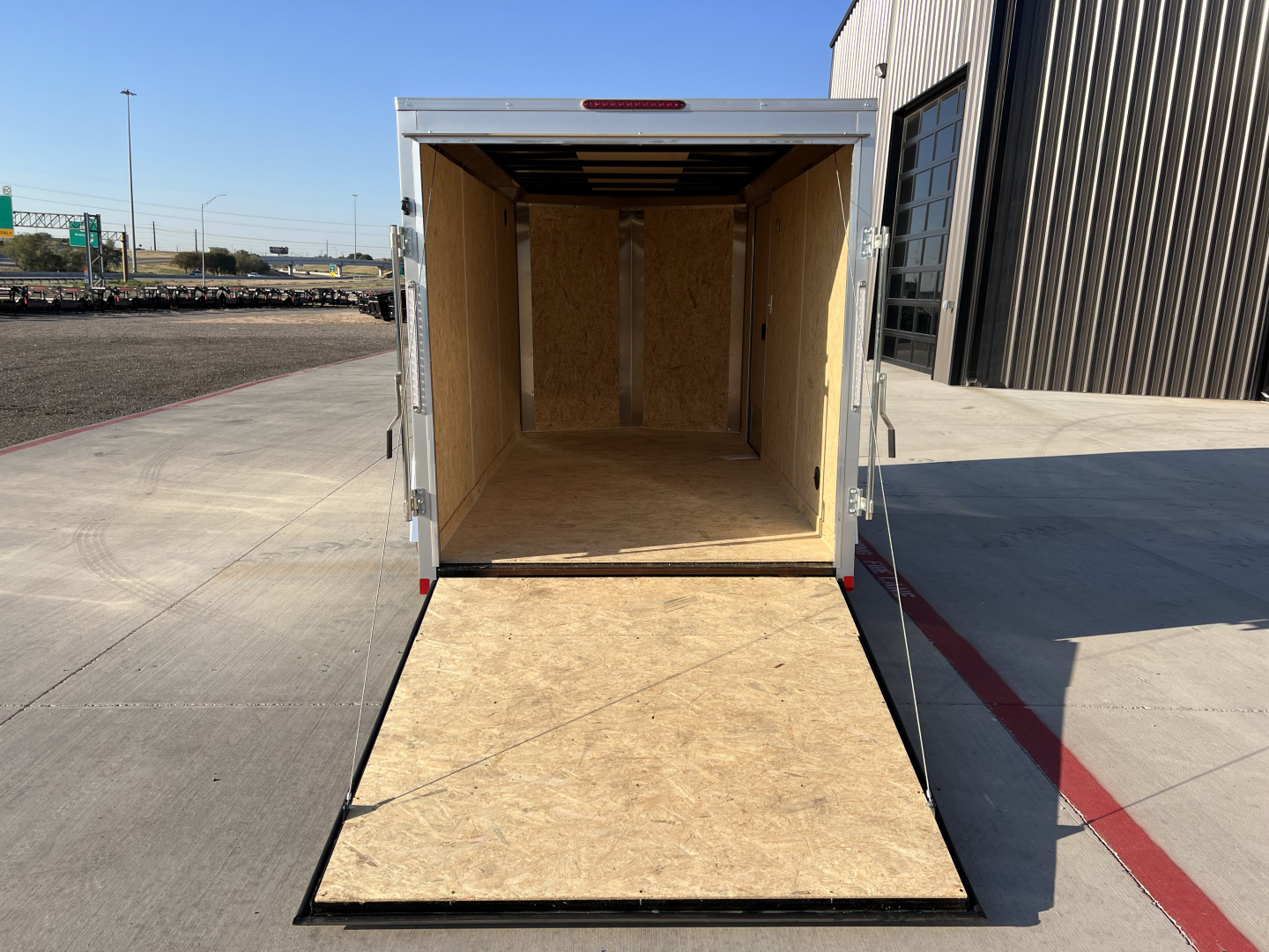 New 2026 Compass 6'x12' Enclosed Cargo Trailer - Indigo DLX