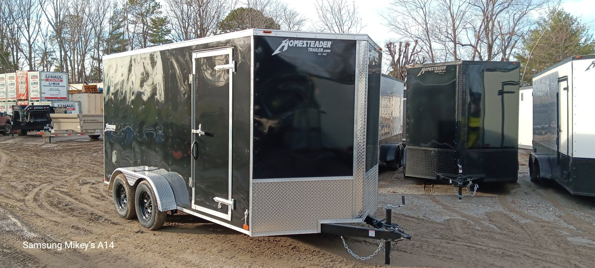 New 2026 Homesteader Trailers / 714IT Intrepid / 6'6" Interior Height / .030 Black Aluminum / Ramp Rear Door / 32" Side Door