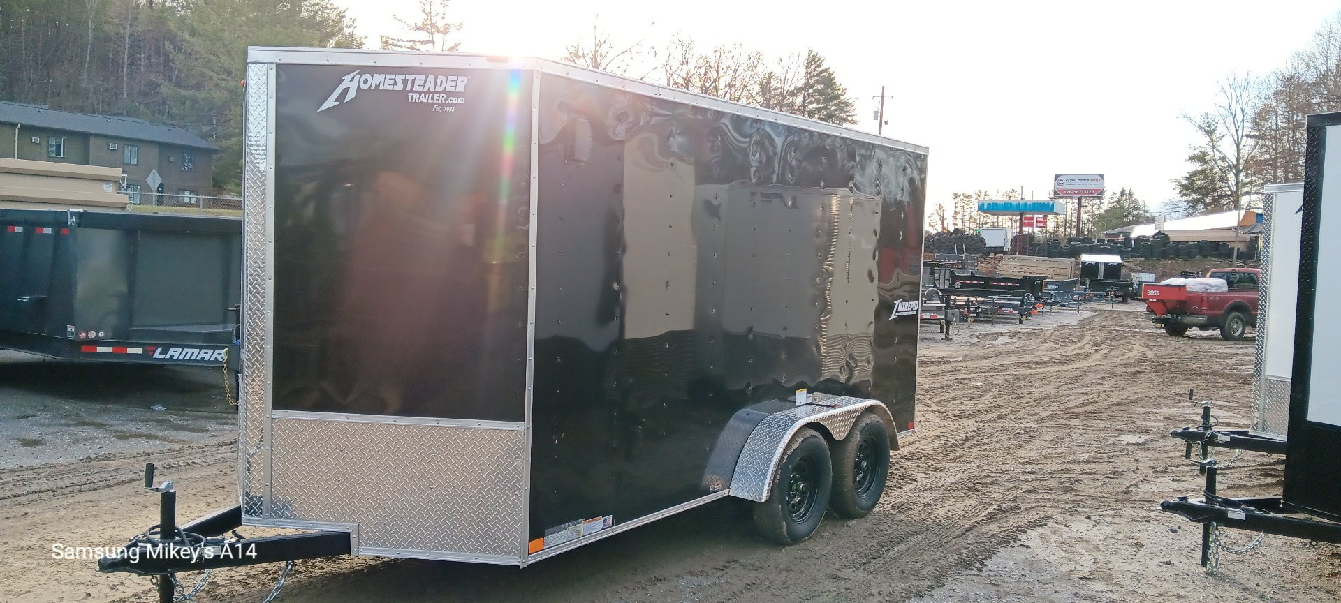 New 2026 Homesteader Trailers / 714IT Intrepid / 6'6" Interior Height / .030 Black Aluminum / Ramp Rear Door / 32" Side Door