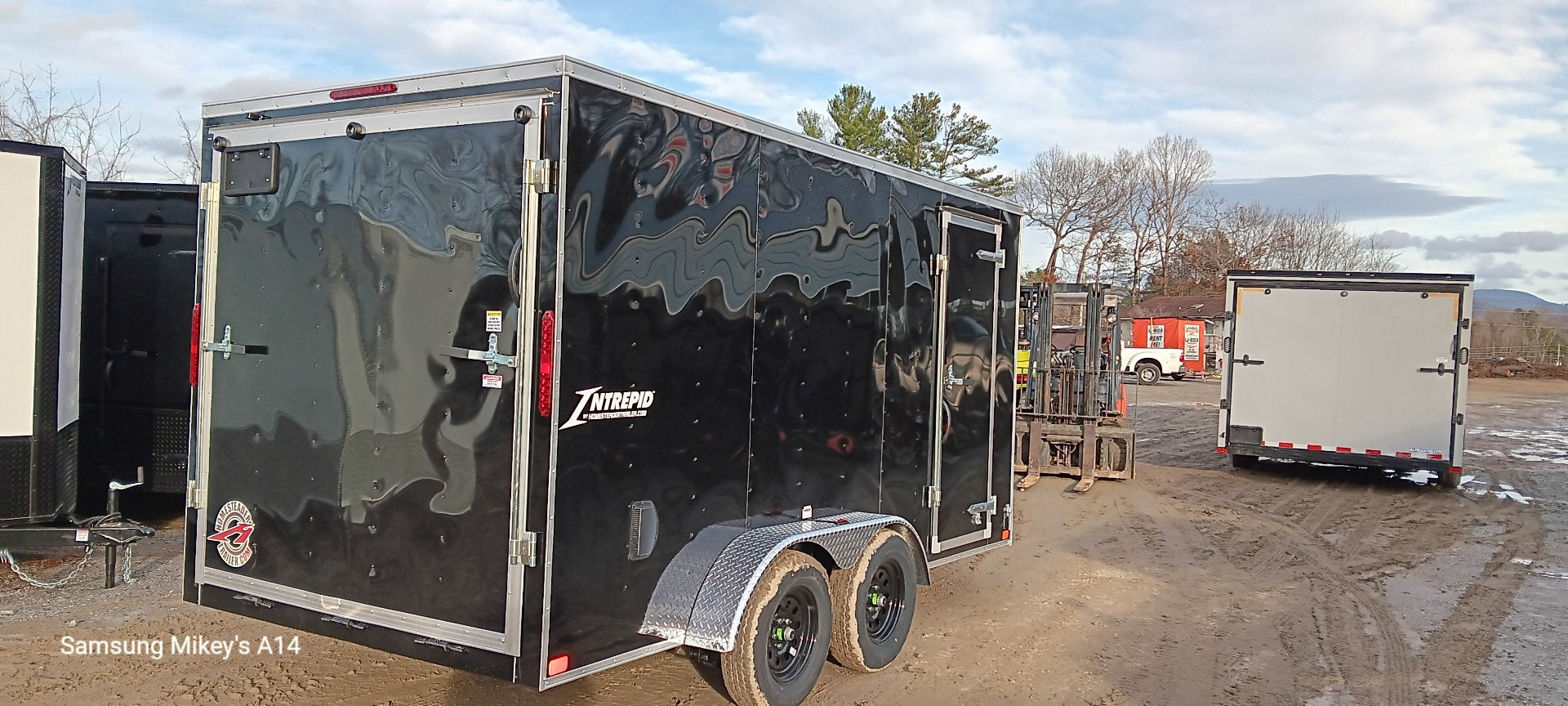 New 2026 Homesteader Trailers / 714IT Intrepid / 6'6" Interior Height / .030 Black Aluminum / Ramp Rear Door / 32" Side Door
