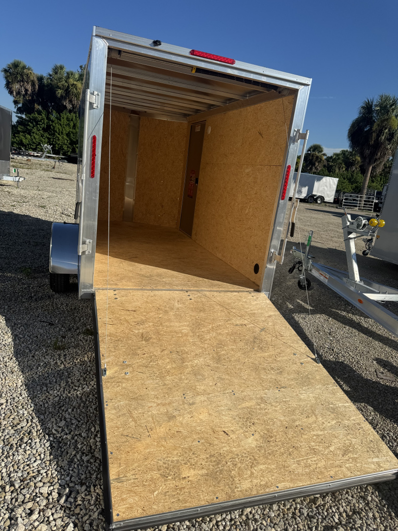 New 2026 ALCOM 6X12 SINGLE AXLE 2990 LB GVWR ALUMINUM Cargo / Enclosed Trailer WITH 6'6" INTERIOR HEIGHT, REAR RAMP DOOR, SCREWLESS EXTERIOR, 1 PIECE ROOF