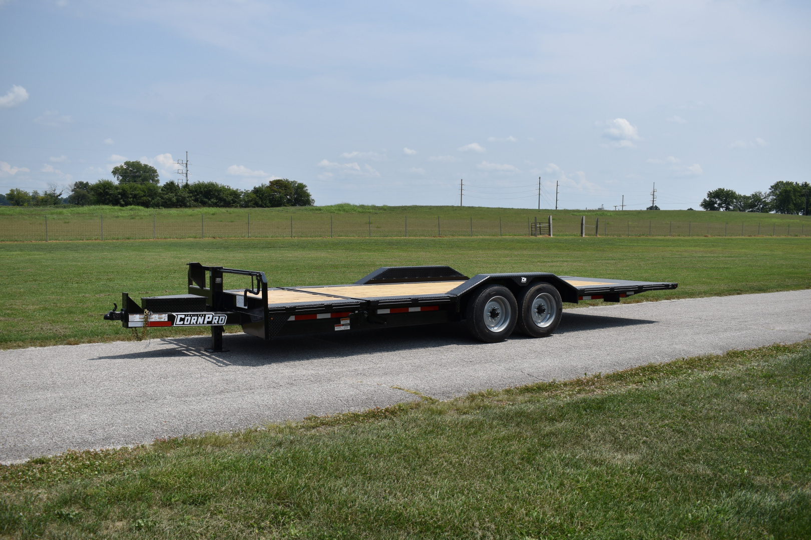 New 2026 CornPro UT-23 XT DRIVE OVER FENDERS Equipment Trailer