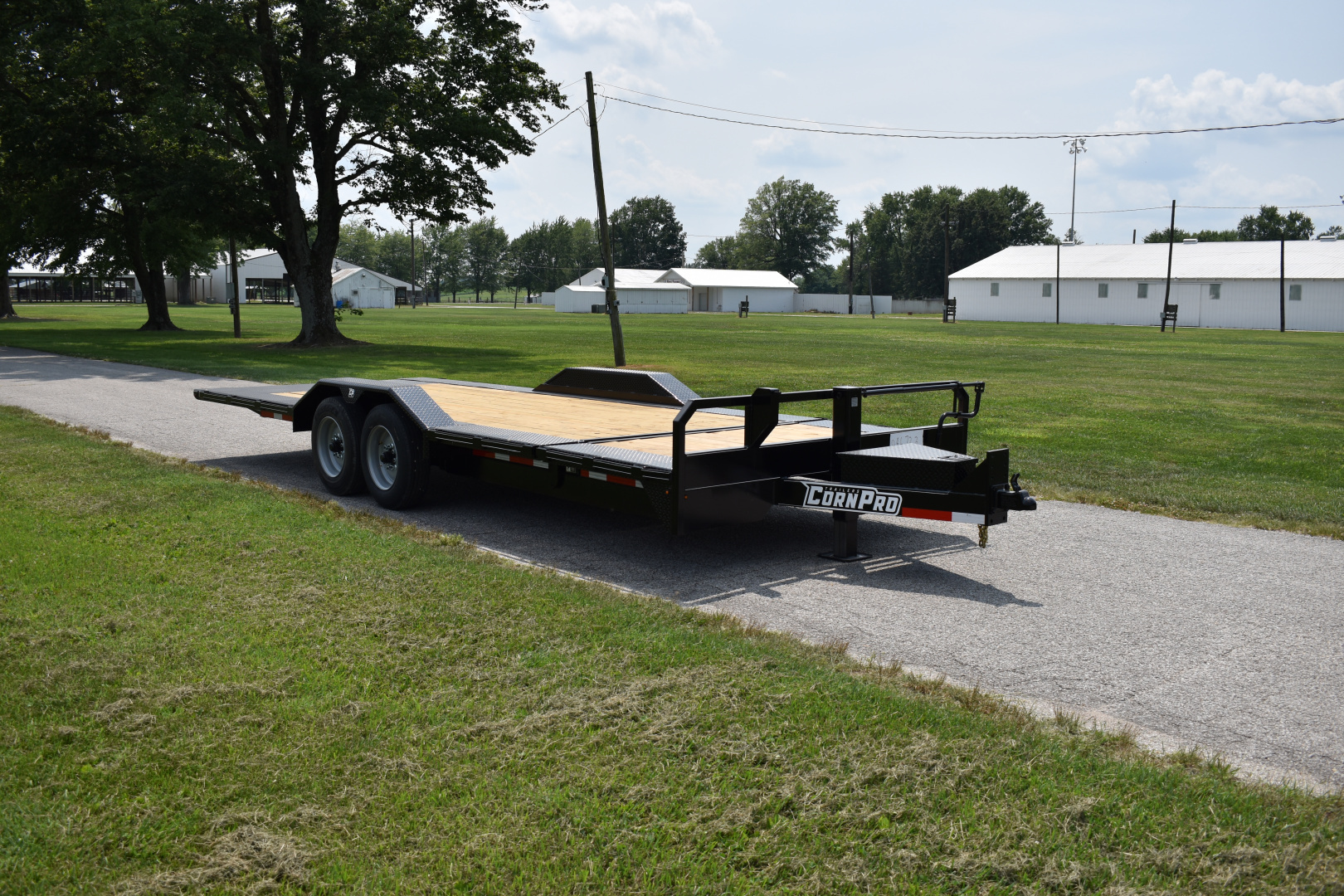 New 2026 CornPro UT-23 XT DRIVE OVER FENDERS Equipment Trailer