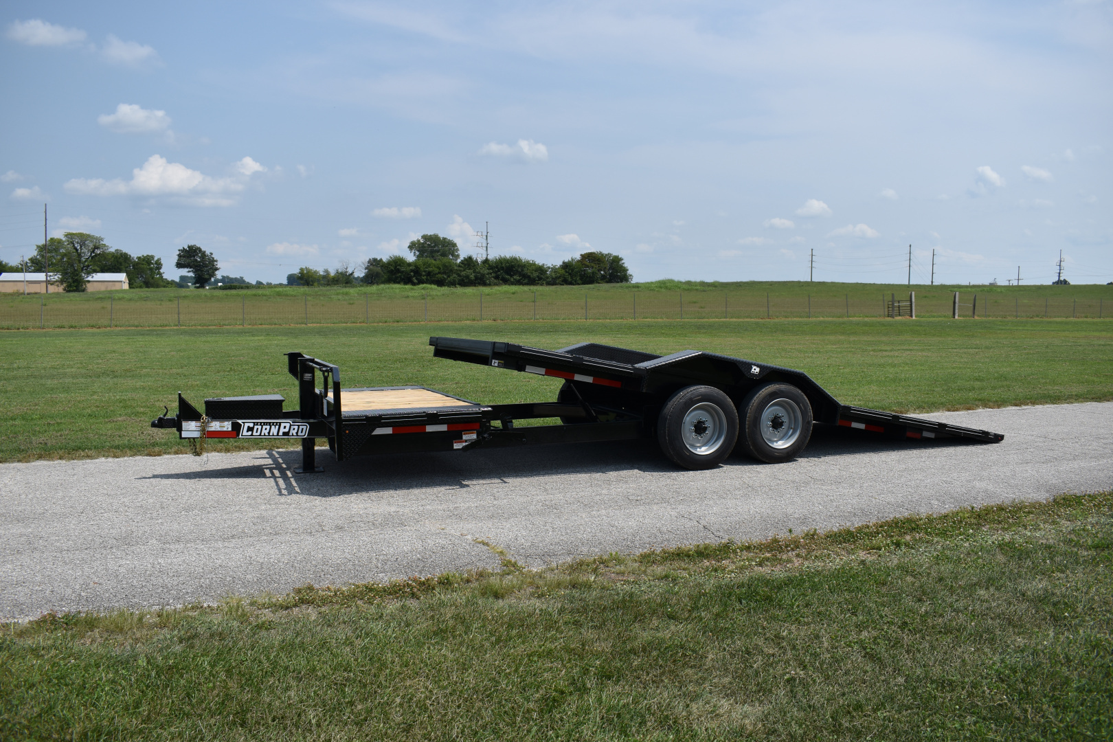 New 2026 CornPro UT-23 XT DRIVE OVER FENDERS Equipment Trailer