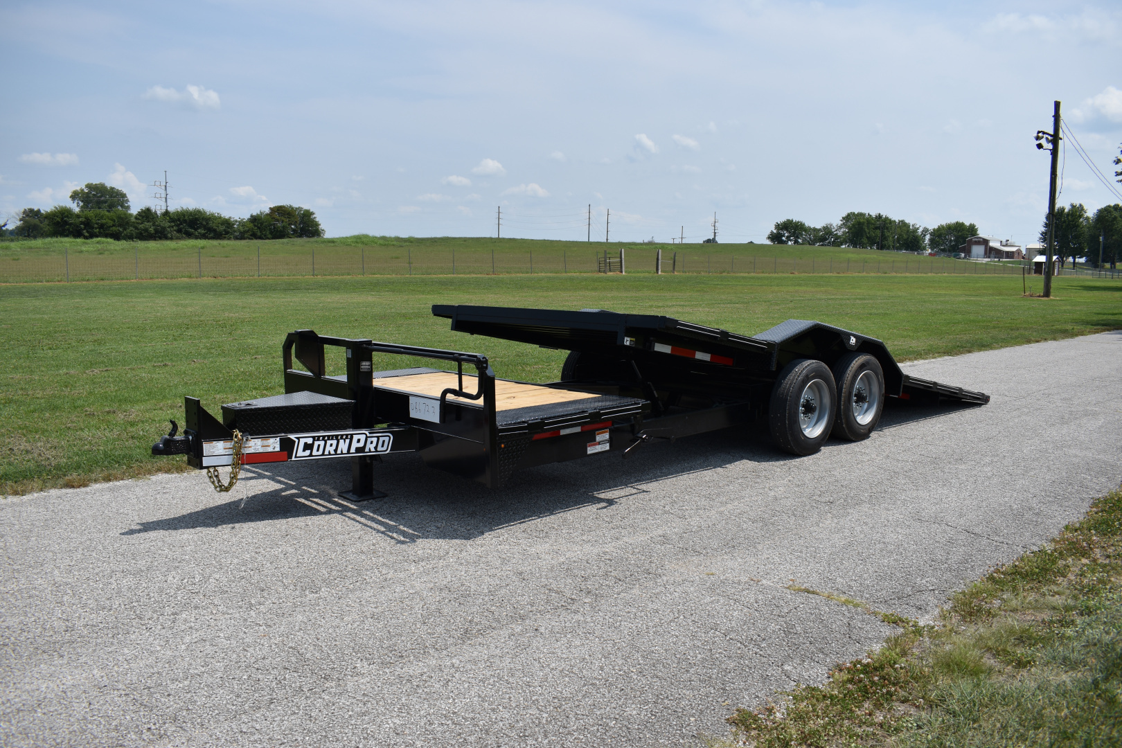 New 2026 CornPro UT-23 XT DRIVE OVER FENDERS Equipment Trailer
