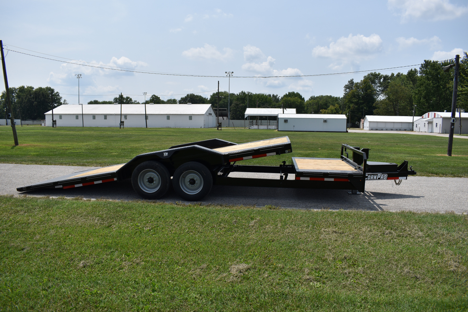 New 2026 CornPro UT-23 XT DRIVE OVER FENDERS Equipment Trailer