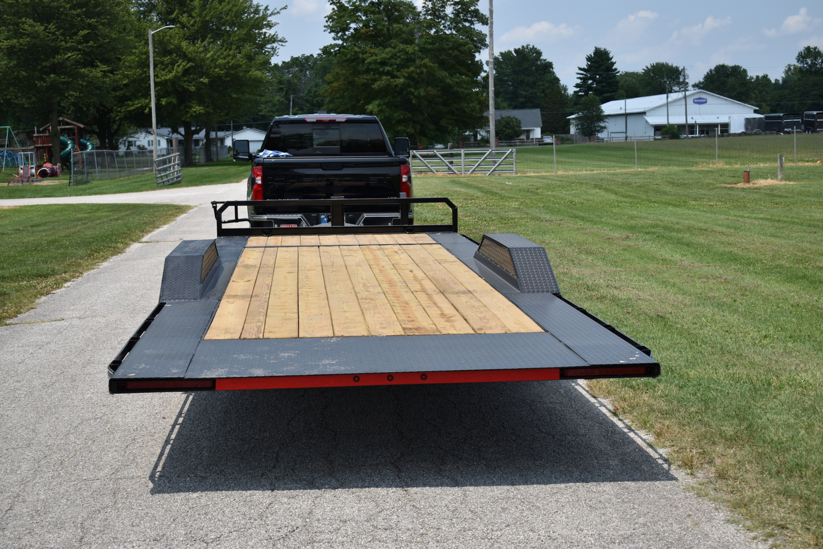 New 2026 CornPro UT-23 XT DRIVE OVER FENDERS Equipment Trailer