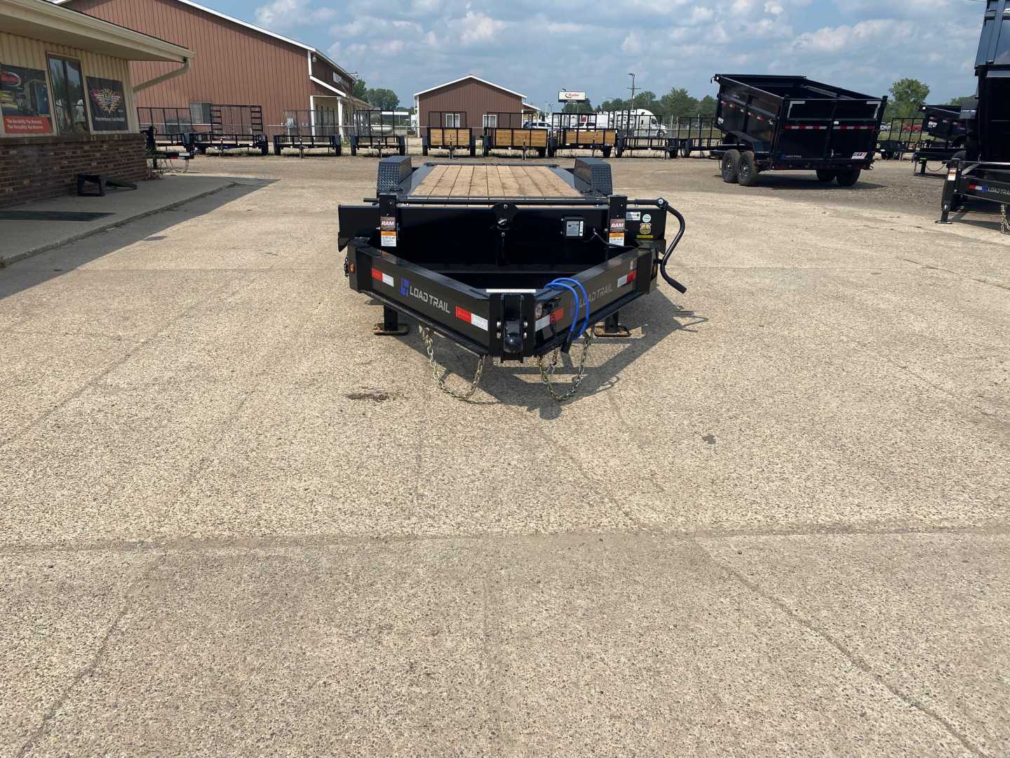 New 2025 Load Trail 83X24 Heavy Duty Gravity Tilt 20k w/Fork Holders Tilt Trailer