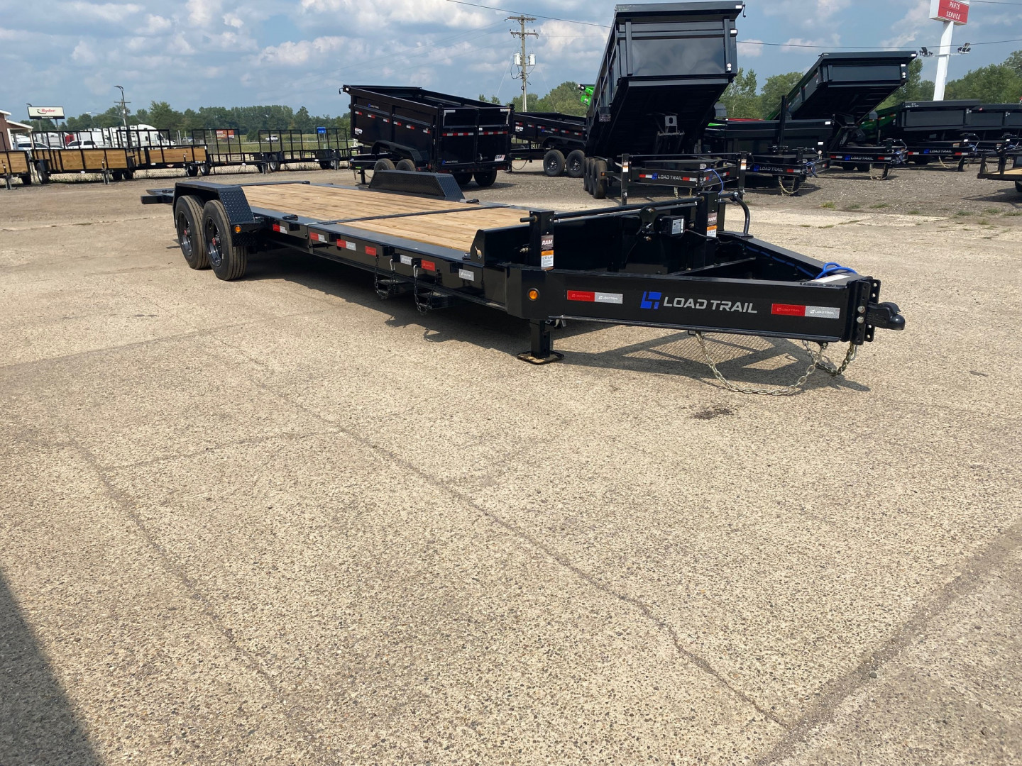 New 2025 Load Trail 83X24 Heavy Duty Gravity Tilt 20k w/Fork Holders Tilt Trailer