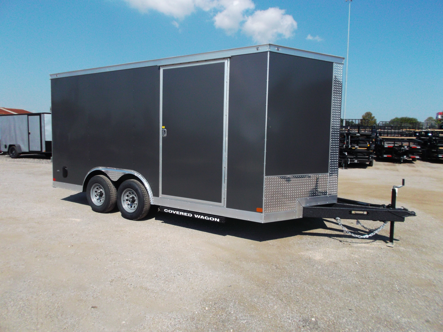 New 2026 Covered Wagon Trailers 8.5x16 Cargo Trailer / Car Hauler / 5200# Axles / 7ft Interior Height / 48" RV Side Door / .080 Charcoal Gray Poly Core Semi-Screwless Exterior / 60" Triple Tube Tongue / Extra Wide Ramp