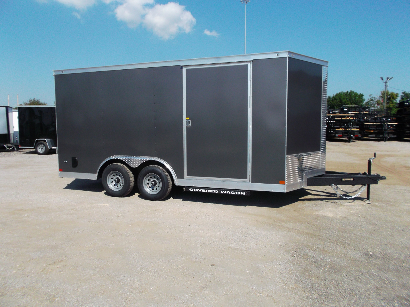 New 2026 Covered Wagon Trailers 8.5x16 Cargo Trailer / Car Hauler / 5200# Axles / 7ft Interior Height / 48" RV Side Door / .080 Charcoal Gray Poly Core Semi-Screwless Exterior / 60" Triple Tube Tongue / Extra Wide Ramp