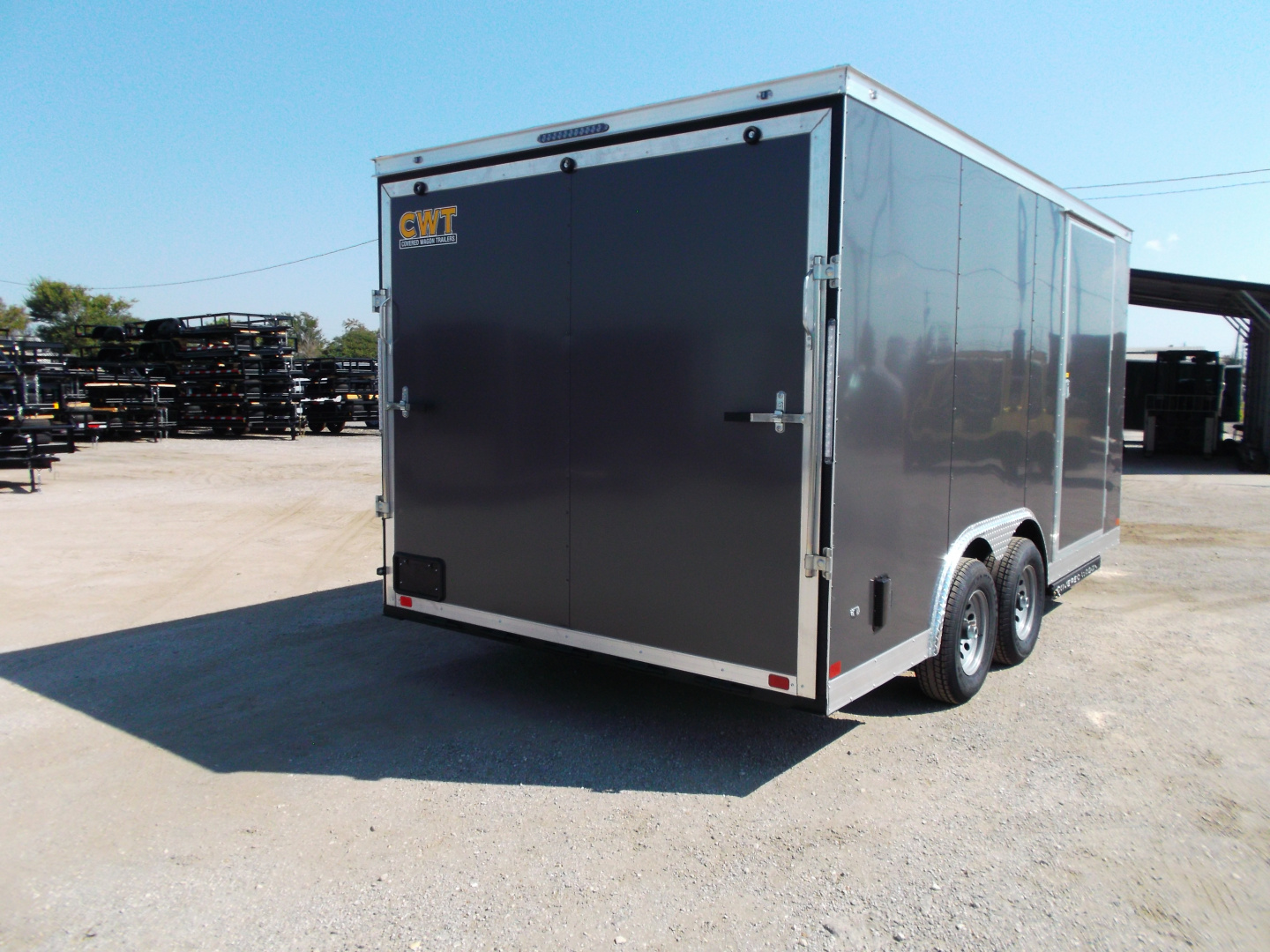 New 2026 Covered Wagon Trailers 8.5x16 Cargo Trailer / Car Hauler / 5200# Axles / 7ft Interior Height / 48" RV Side Door / .080 Charcoal Gray Poly Core Semi-Screwless Exterior / 60" Triple Tube Tongue / Extra Wide Ramp
