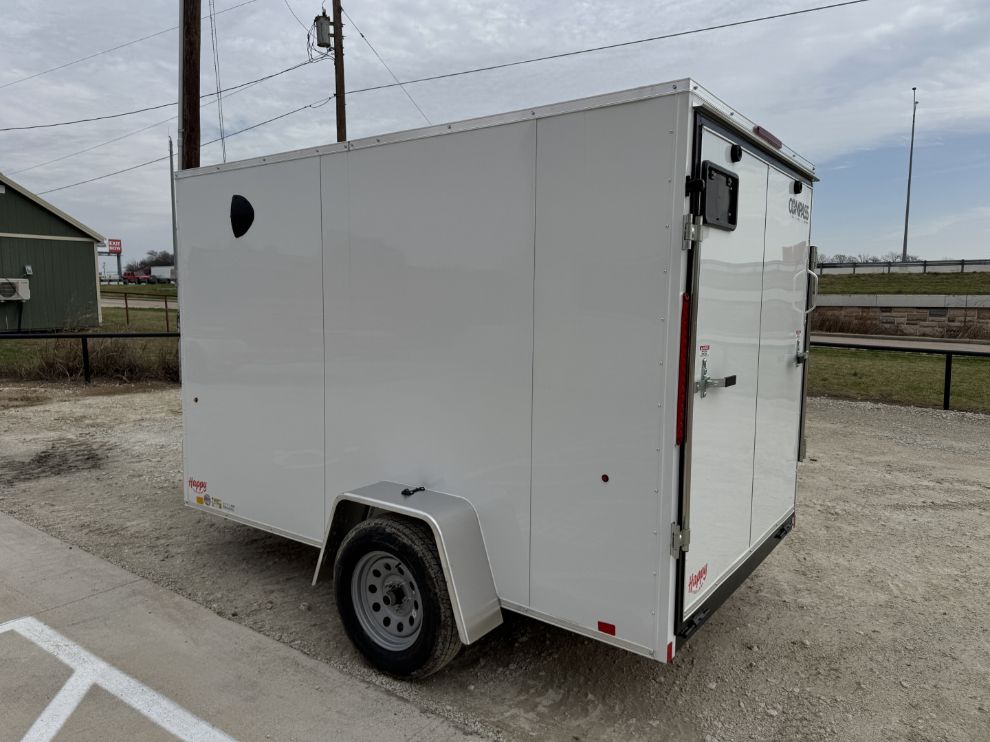 New 2026 Compass 6'x10' Enclosed Cargo Trailer - Indigo DLX