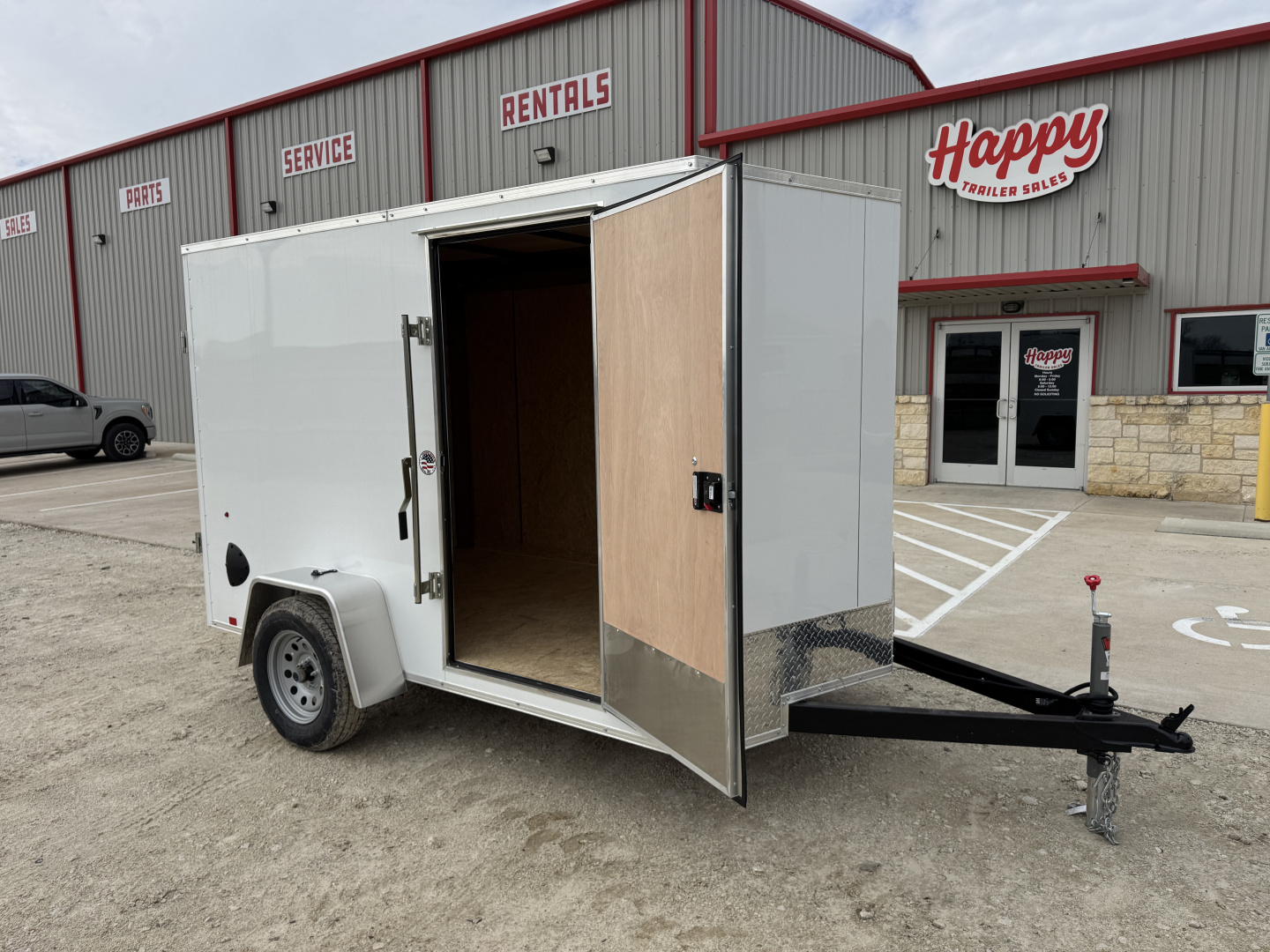 New 2026 Compass 6'x10' Enclosed Cargo Trailer - Indigo DLX