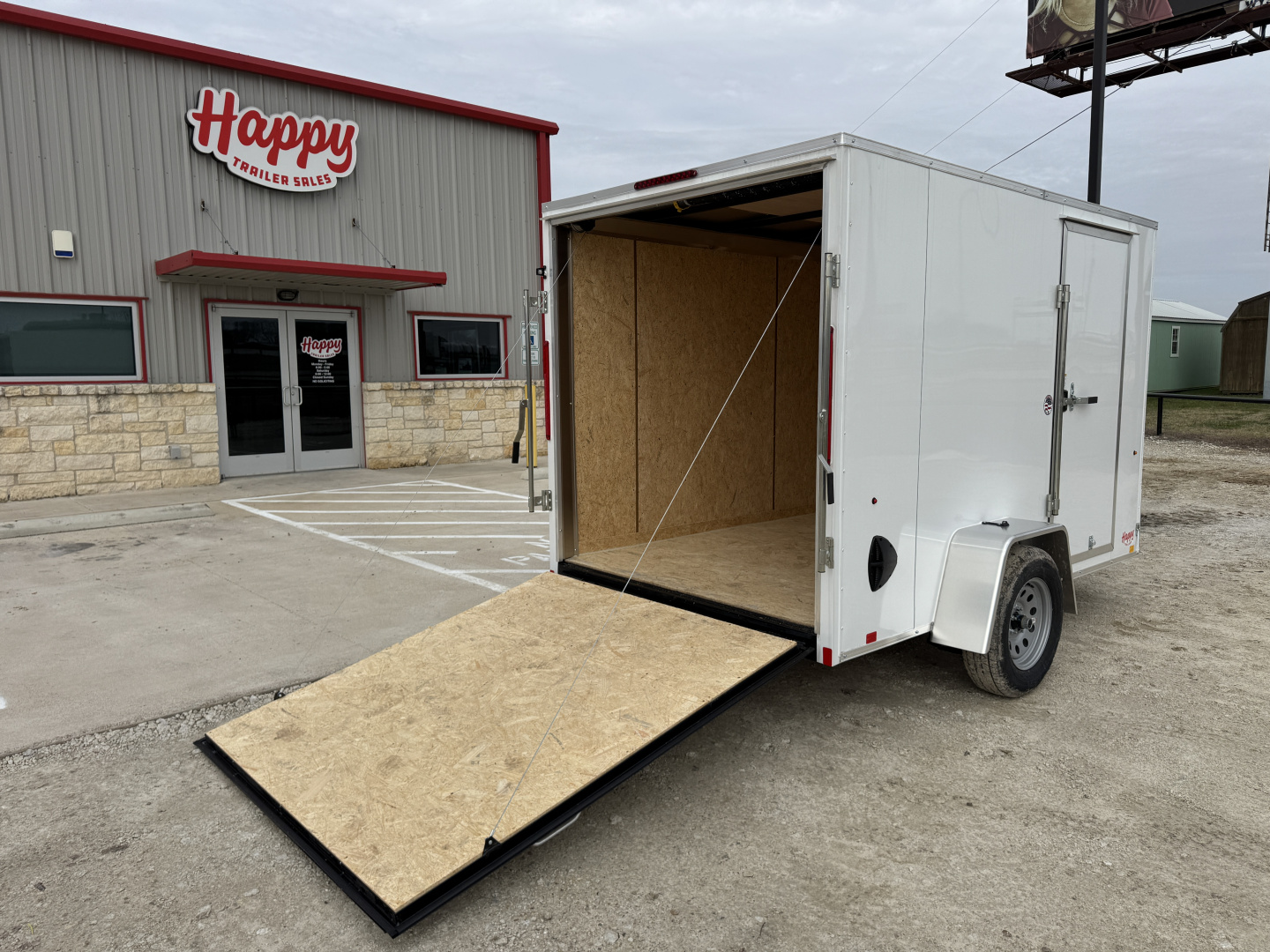 New 2026 Compass 6'x10' Enclosed Cargo Trailer - Indigo DLX