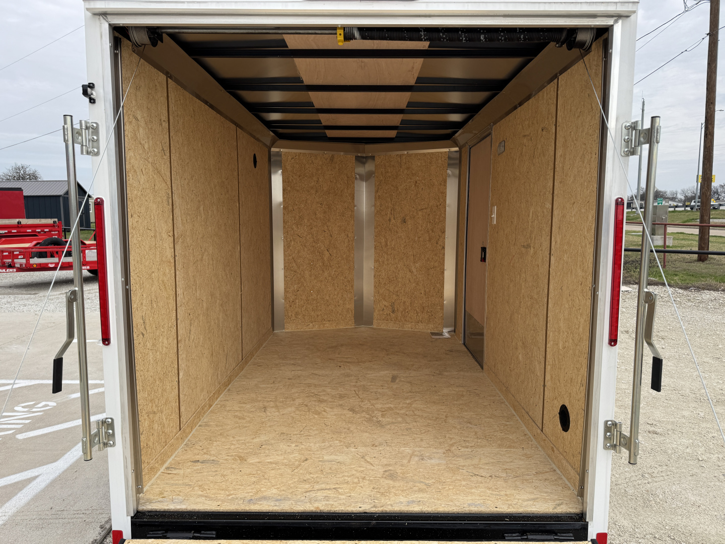 New 2026 Compass 6'x10' Enclosed Cargo Trailer - Indigo DLX