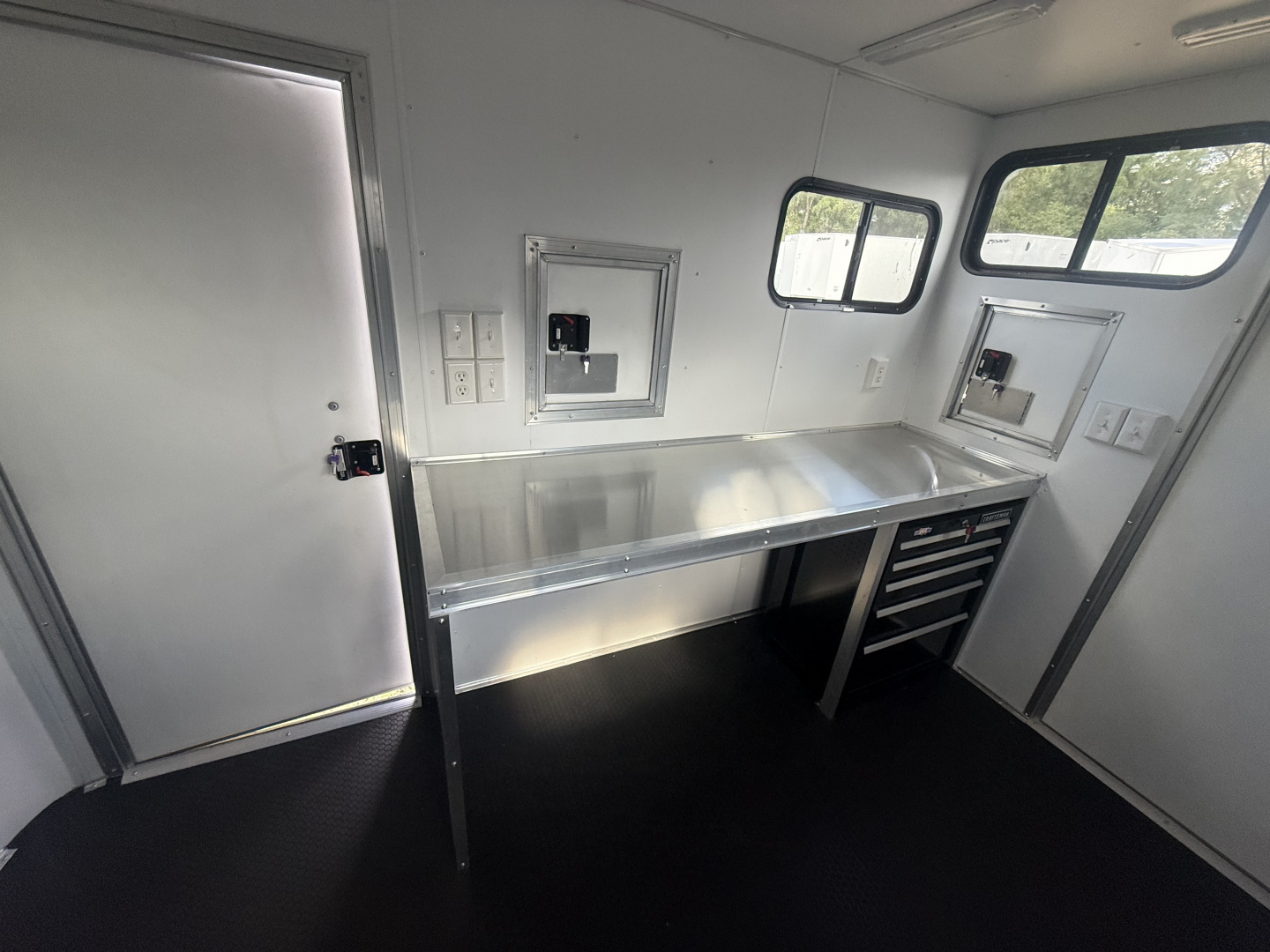 New 2025 Team Spirit Trailers 6x10 fiber trailer screwless,Insulated walls 110 package with 30 amp cord 12 volt charger 13.5 AC toolbox ext toing 2 fiber doors spare tire mount with spare tire 12 volt LED light on ceiling Fiber Splicing