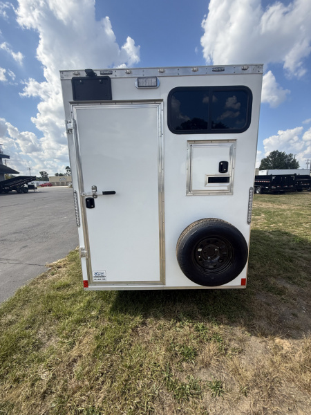 New 2025 Team Spirit Trailers 6x10 fiber trailer screwless,Insulated walls 110 package with 30 amp cord 12 volt charger 13.5 AC toolbox ext toing 2 fiber doors spare tire mount with spare tire 12 volt LED light on ceiling Fiber Splicing