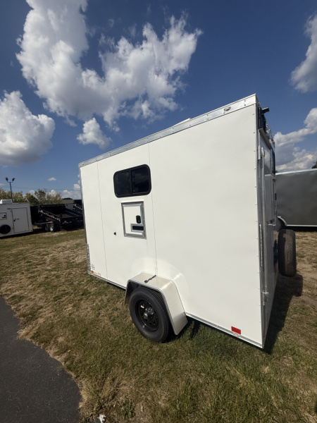 New 2025 Team Spirit Trailers 6x10 fiber trailer screwless,Insulated walls 110 package with 30 amp cord 12 volt charger 13.5 AC toolbox ext toing 2 fiber doors spare tire mount with spare tire 12 volt LED light on ceiling Fiber Splicing
