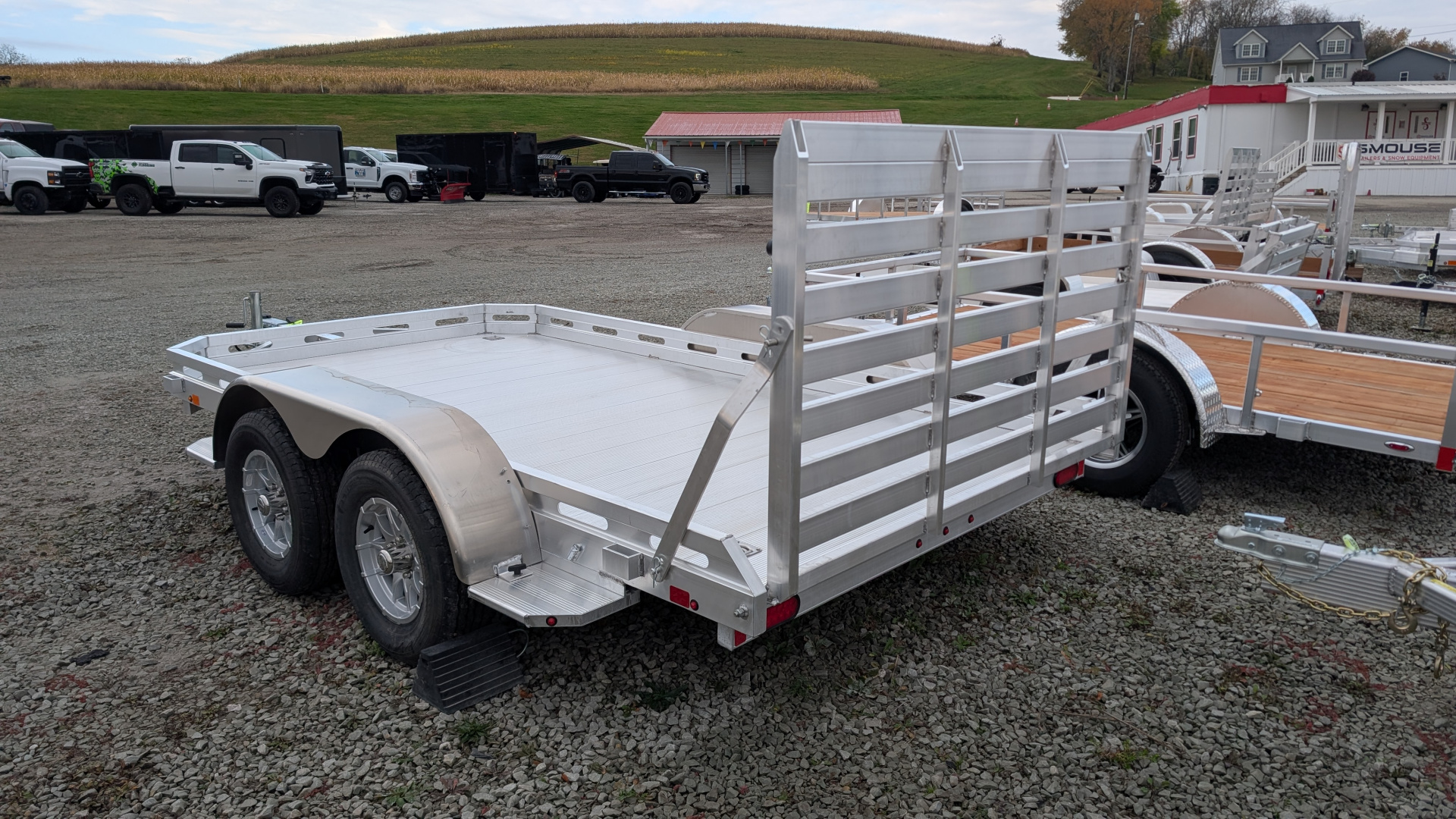 New 2026 Aluma 6'6 x 12' Tandem Utility Trailer w/ 4' Gate