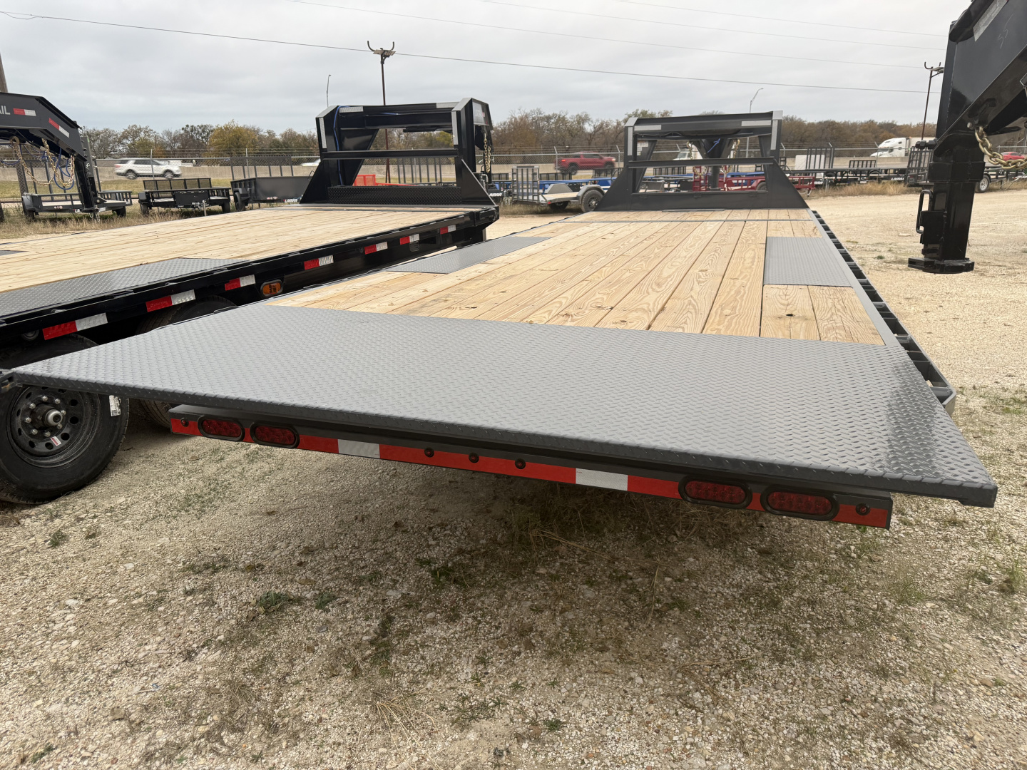 New 2026 Lamar Trailers 102X24 GN 14K Tilt Trailer