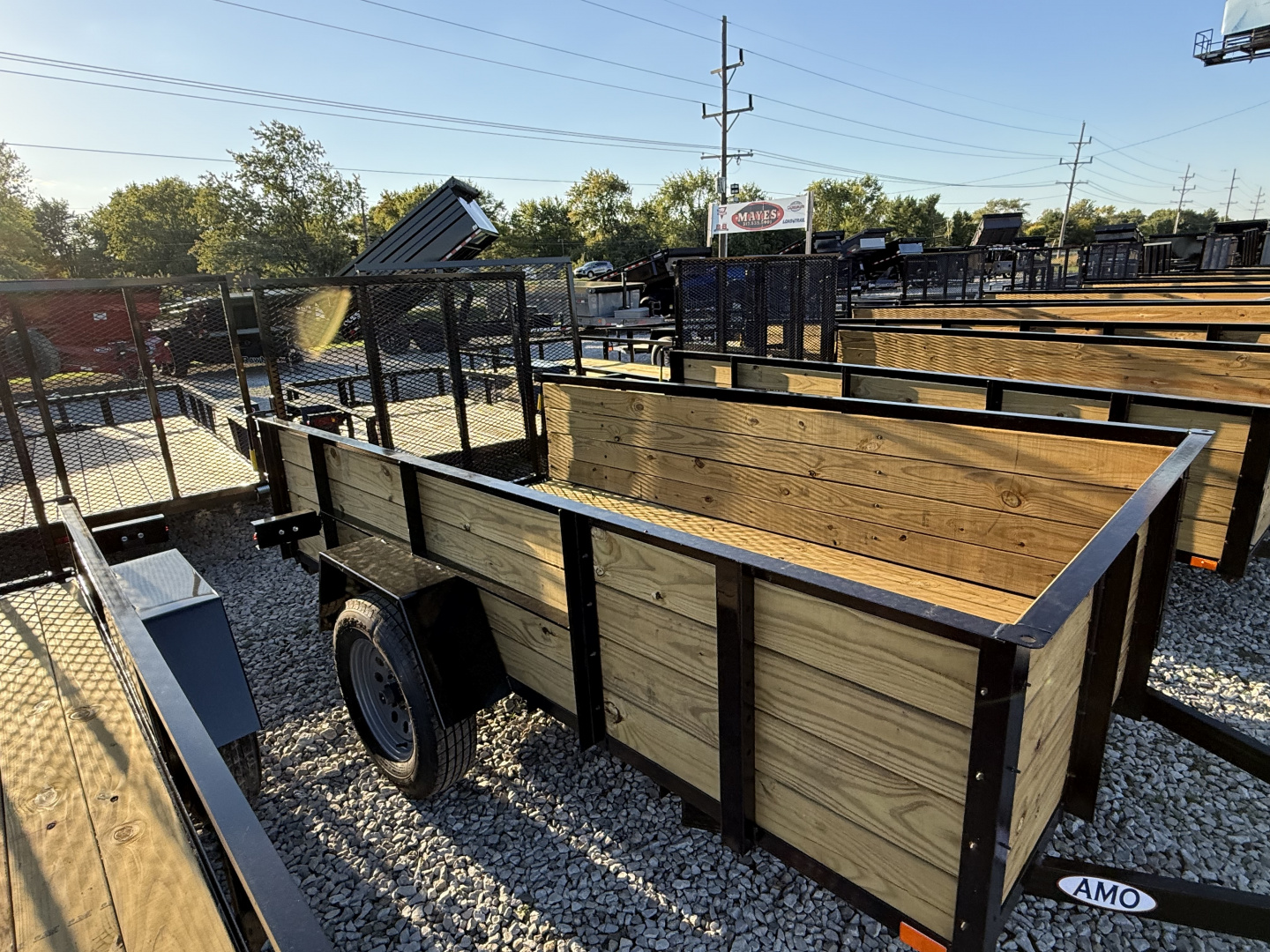 New 2026 AMERICAN MANUFACTURING OPERATIONS (AMO) UTILITY US101 60X10 SA WOOD SIDES (GVW:2990) BLACK