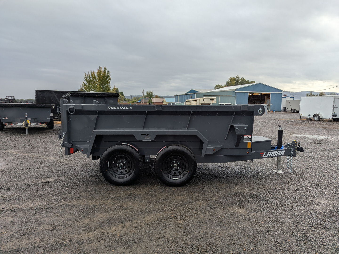 New 2026 Lamar Trailers 60" x 10' - 7K Dump Trailer